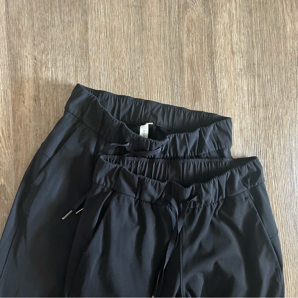 Lululemon On The Fly Pant *28" in black, size 2 (2 pairs)